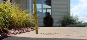 Lifted and repaired concrete driveway by Olshan driveway leveling & repair services.