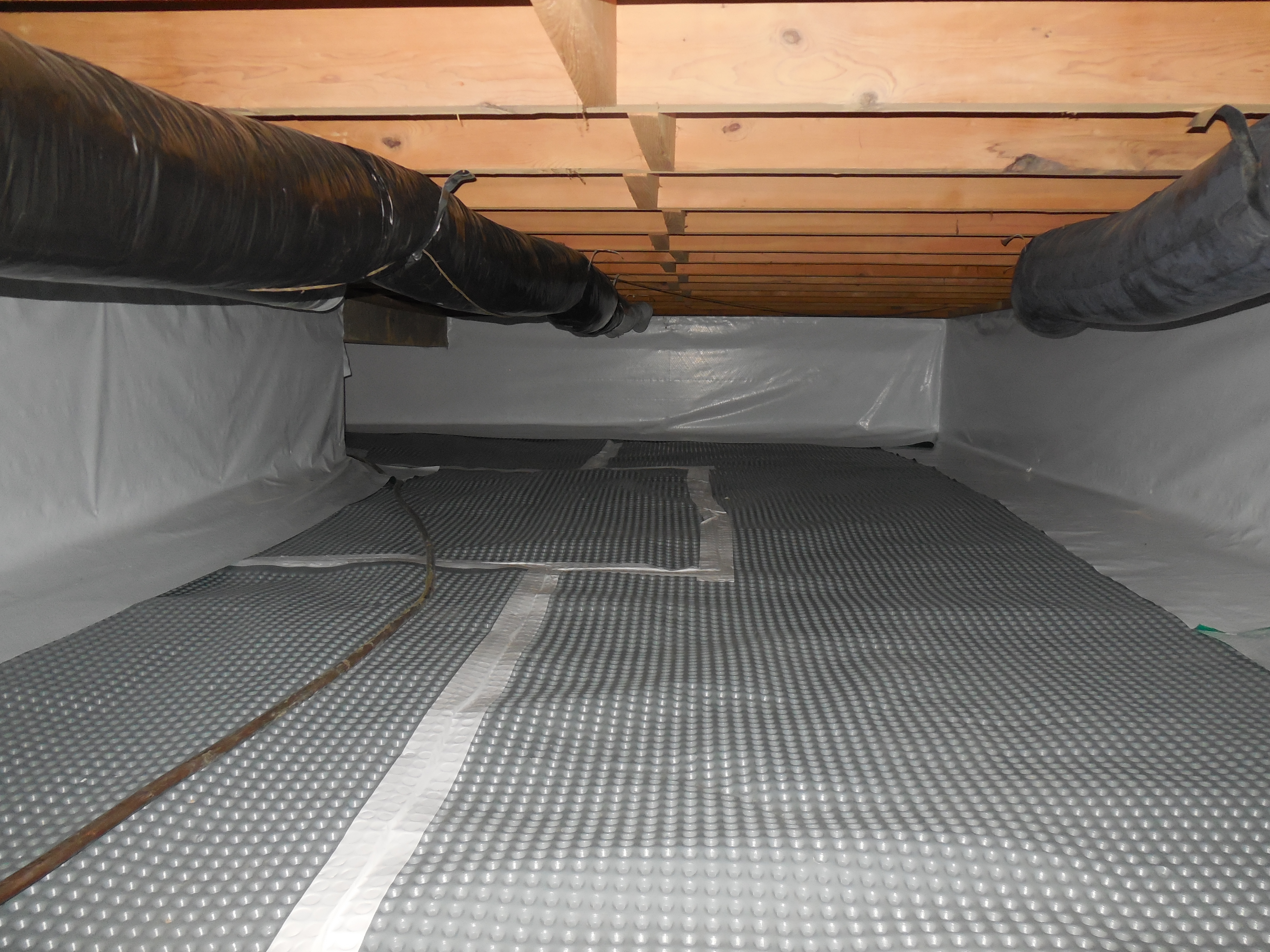 Clarksville The SafeSeal™ encapsulation liner is custom-cut on site to match the home’s dimensions and fastened with specialized sealants and mechanical anchors.
