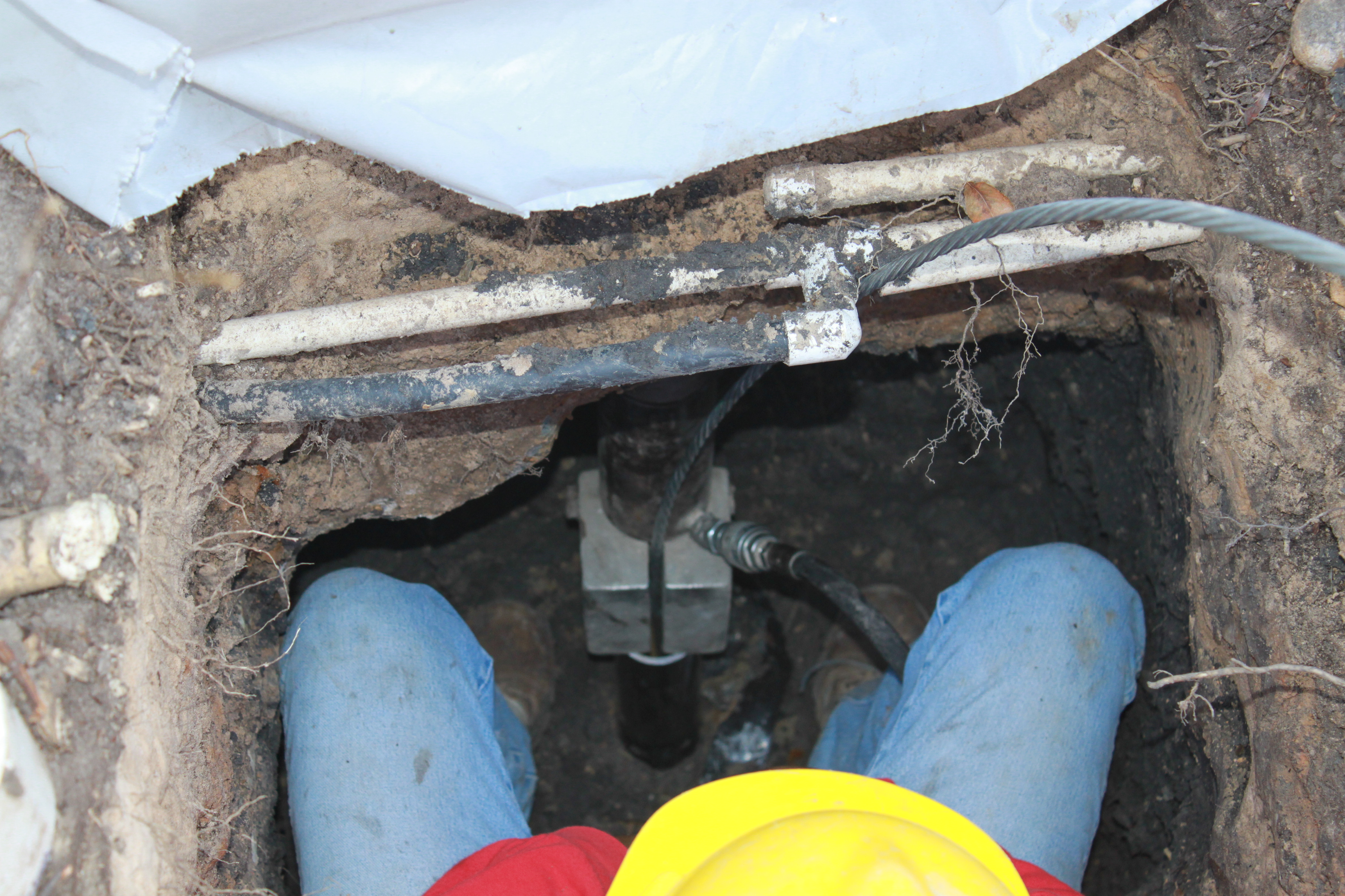 image1-emporia-foundation-repair A Certified Structural Technician installing the CableLock system