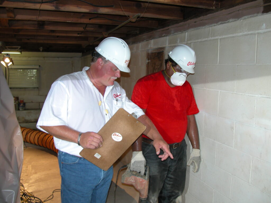 Certified Structural Technician focuses on cracks in floors and walls
