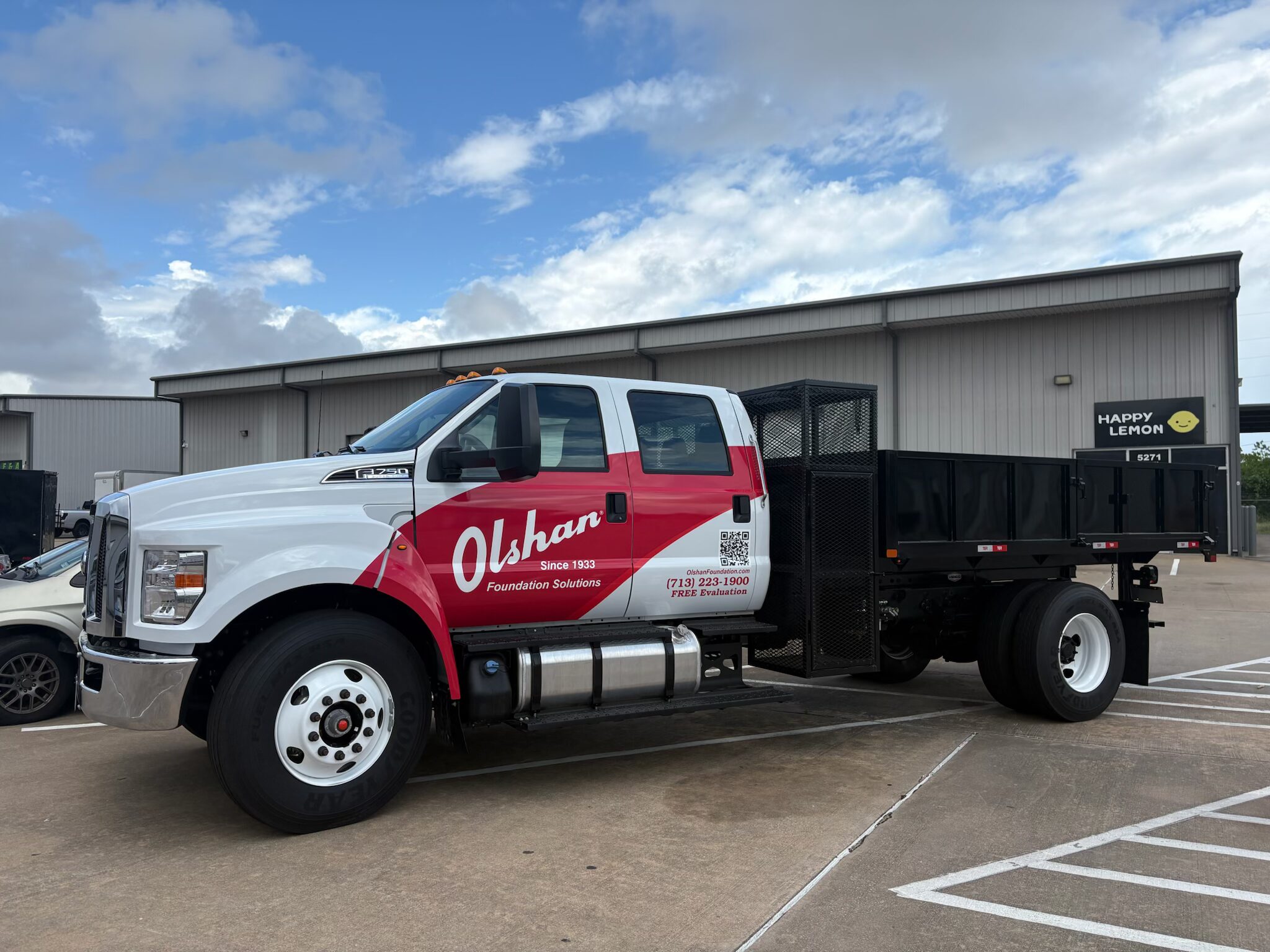 Olshan commercial crew truck on site