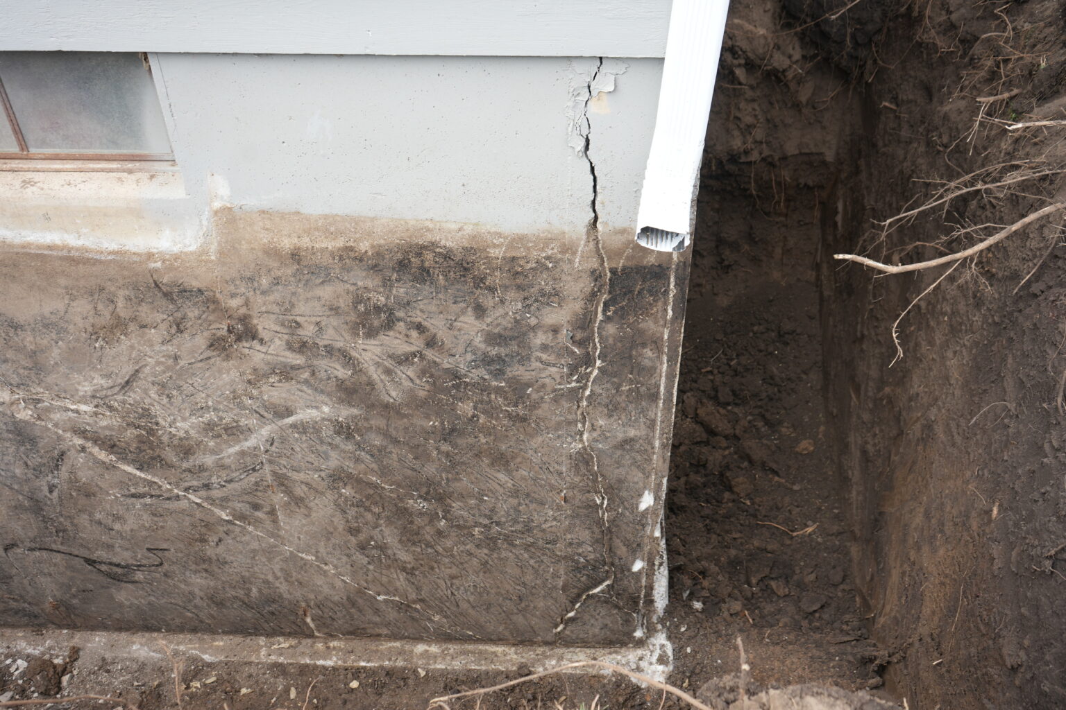 Horizontal crack on an exterior basement wall exposed by excavation